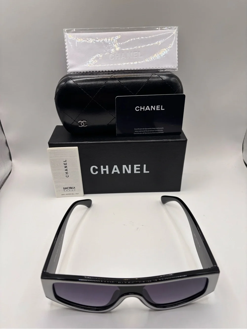 CHANEL Black Shield Sunglasses with Purple Gradient Lenses